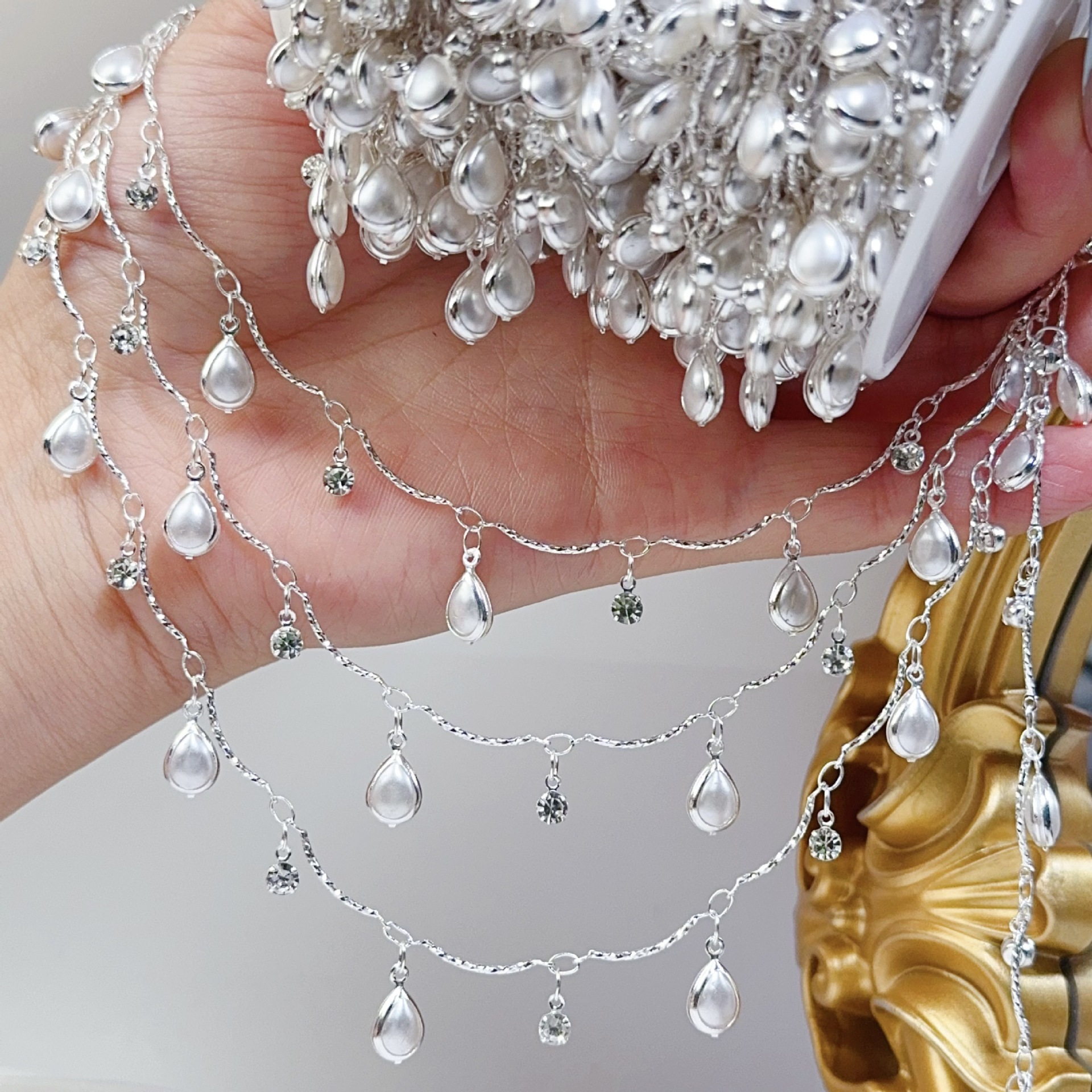 0.5/1/2M Exquisite Curved Stic – Pearl Trim Chain Bewertung und Preis